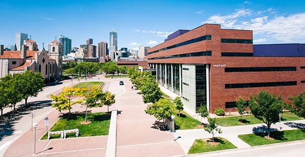 The King Center building with Denver skyline in background